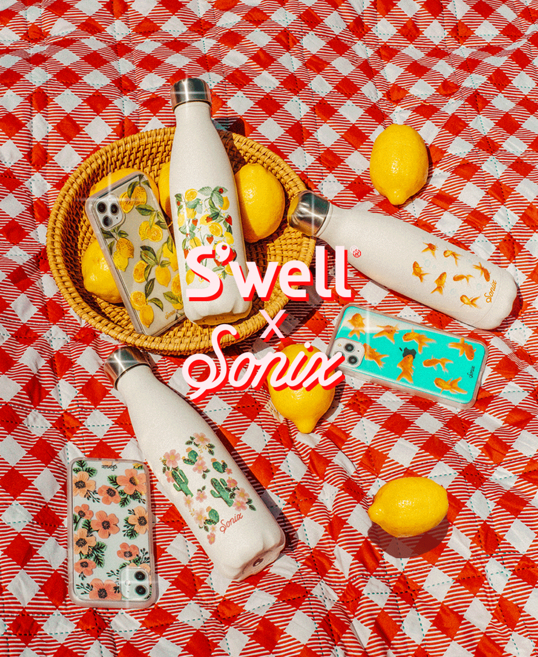 S’well bottles and Sonix patterned iPhone cases on a red gingham picnic blanket with lemons and S’well x Sonix overlay