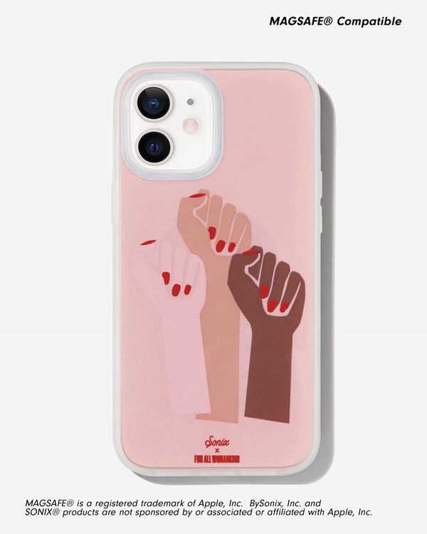 three fists with red nail polish on a pink background shown on an iphone 12