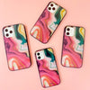 Quartz iPhone 12 Case. Features a marbled print with a black bumper.