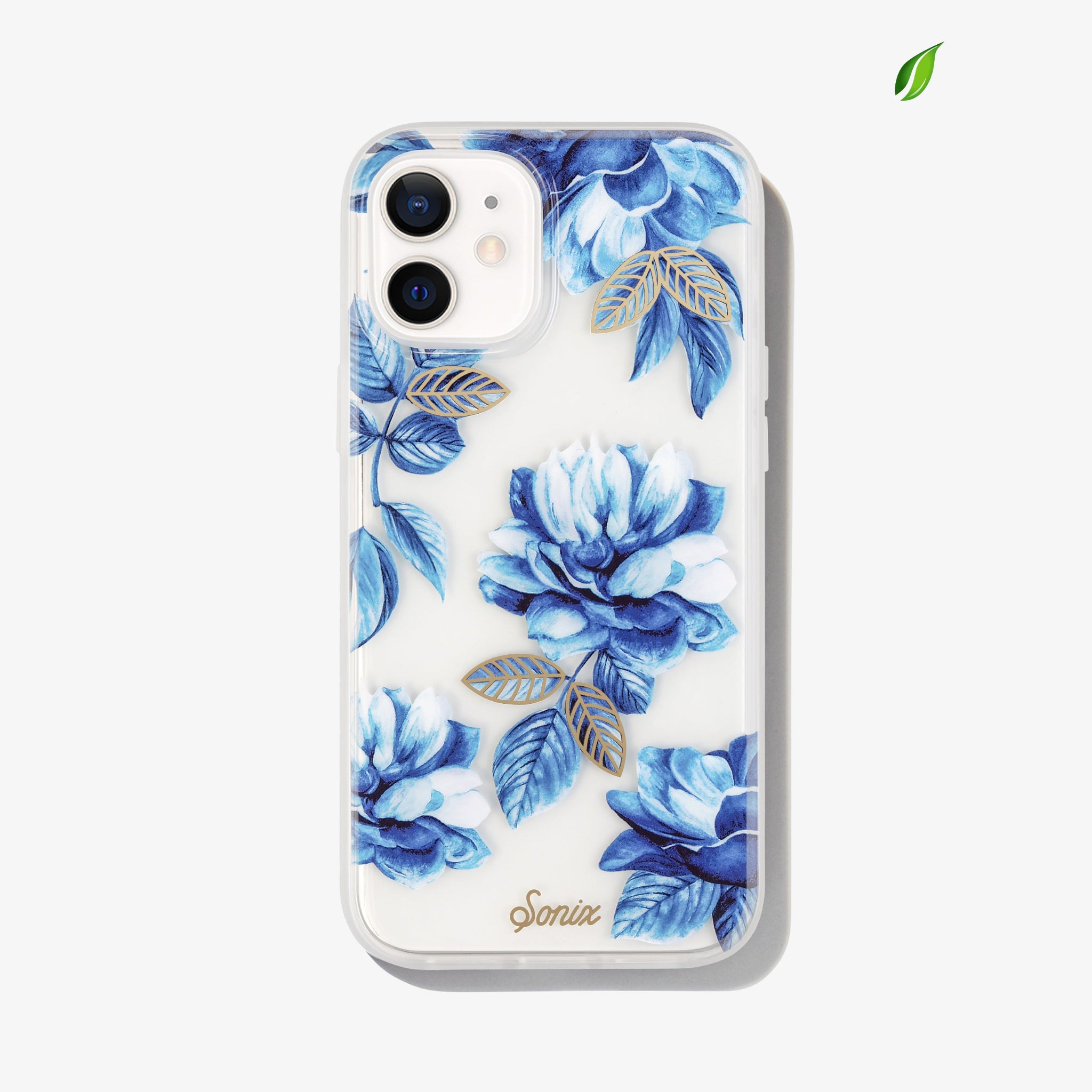 deep blue floral design with gold embroidered leaves shown on an iphone 12