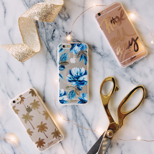 deep blue floral design with gold embroidered leaves shown on an iphone
