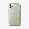a leaf design, embellished with an assortment of green rhinestones shown on an iphone 11 pro