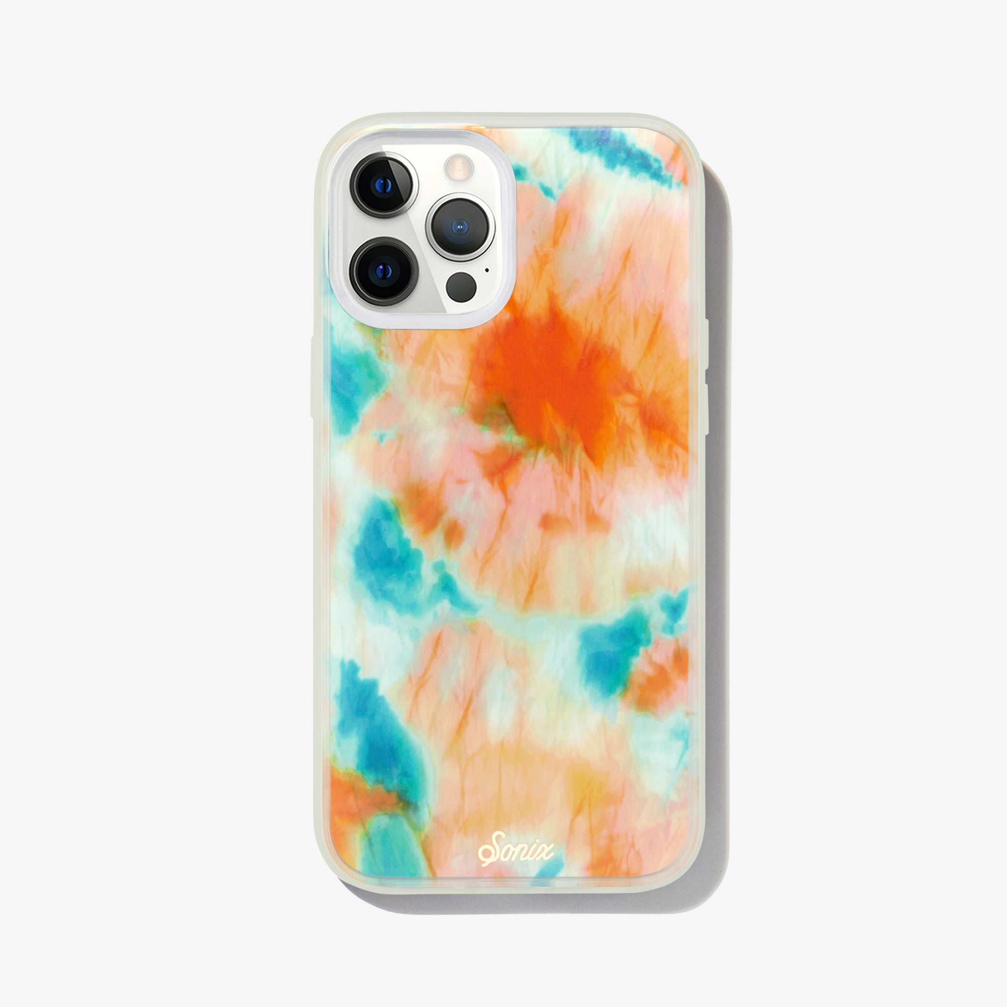 orange and blue tie-dye design that glows in the dark shown on an iphone 12 pro